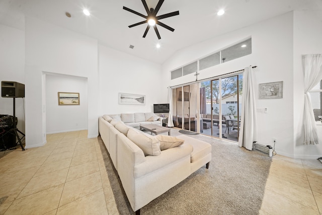 tiled living room with high vaulted ceiling and ceiling fan