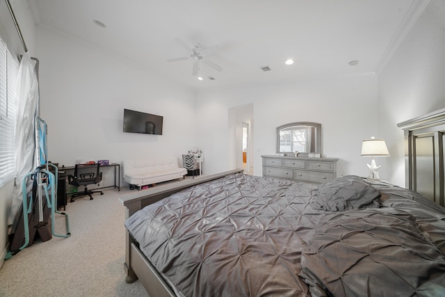 bedroom featuring light carpet, crown molding, and ceiling fan