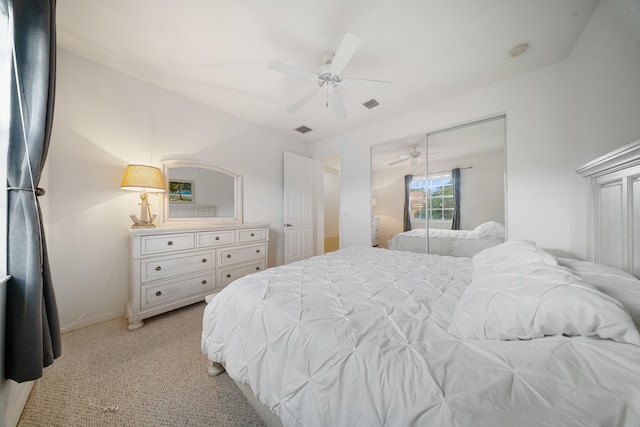 carpeted bedroom featuring ceiling fan