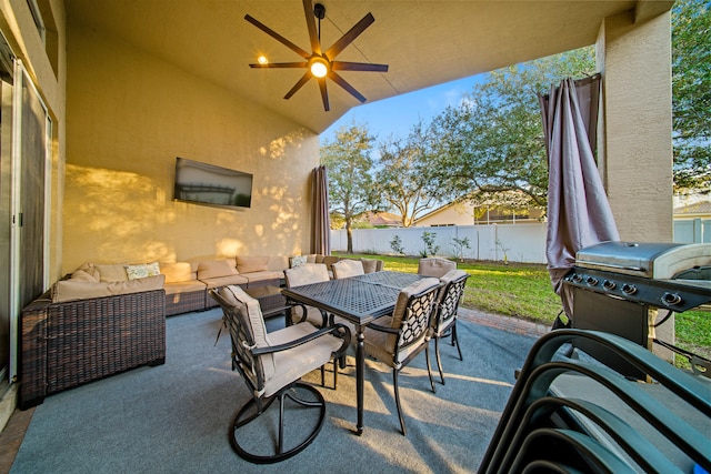 view of patio with ceiling fan, grilling area, and outdoor lounge area