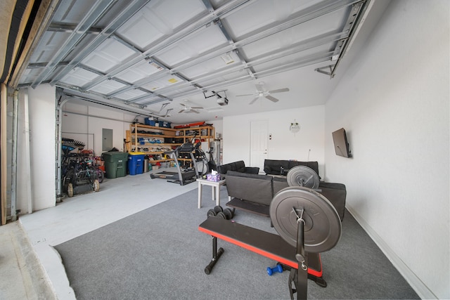 garage with a garage door opener and electric panel