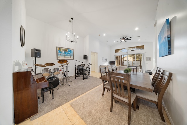 dining area featuring an inviting chandelier, light tile patterned floors, and high vaulted ceiling