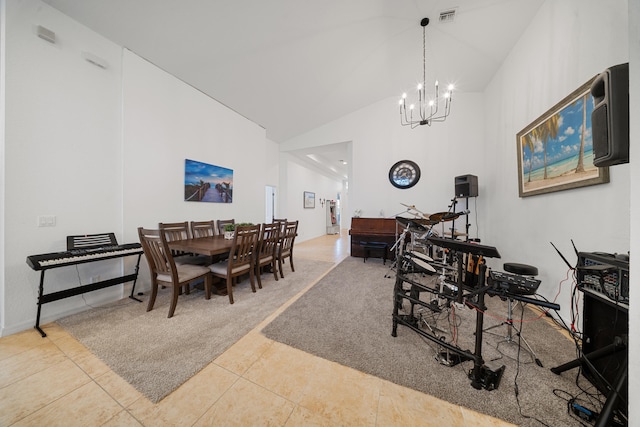 dining space featuring high vaulted ceiling, a chandelier, and tile patterned flooring