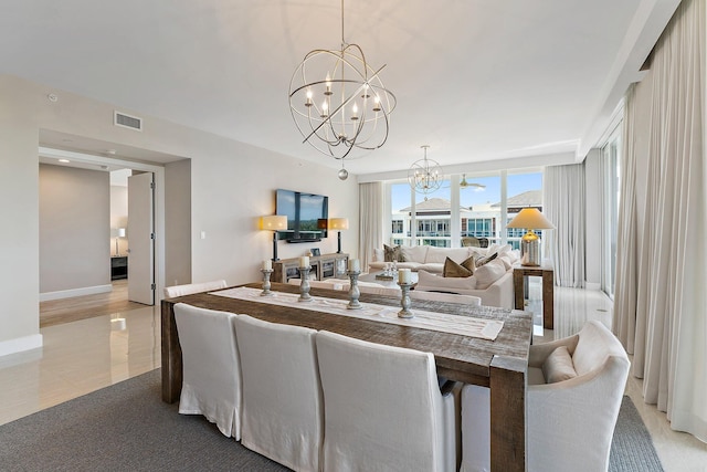 dining area featuring an inviting chandelier