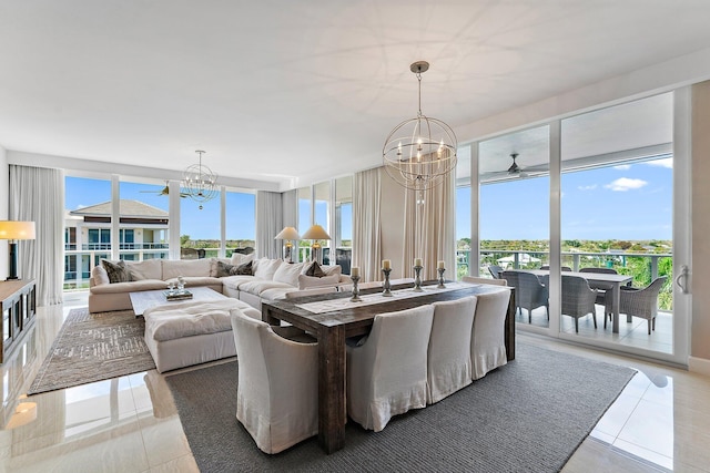 dining area featuring a notable chandelier, a healthy amount of sunlight, and light tile patterned flooring