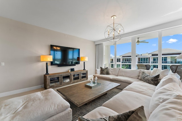 living room with an inviting chandelier