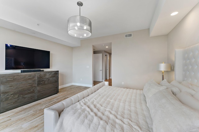 bedroom featuring light wood-type flooring