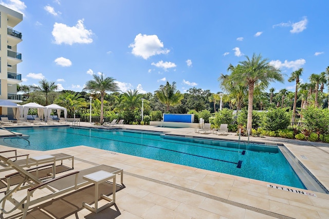 view of swimming pool featuring a patio