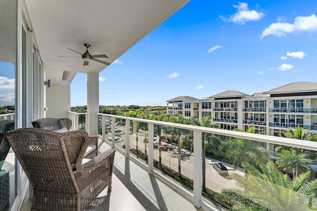 balcony featuring ceiling fan