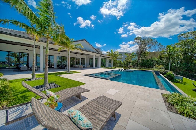 81 S River Rd, Stuart, FL 34996 - view of swimming pool featuring an outdoor living space, a patio area, ceiling fan, and a pool with connected hot tub