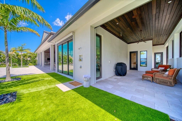 81 S River Rd, Stuart, FL 34996 - view of patio with a ceiling fan and a grill