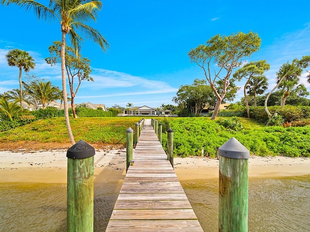 dock area featuring a water view