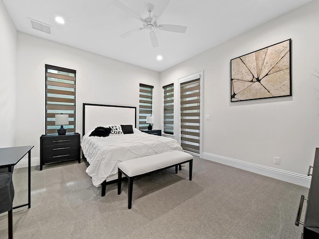 bedroom featuring light carpet and ceiling fan