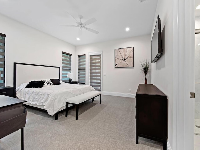 bedroom with light colored carpet and ceiling fan