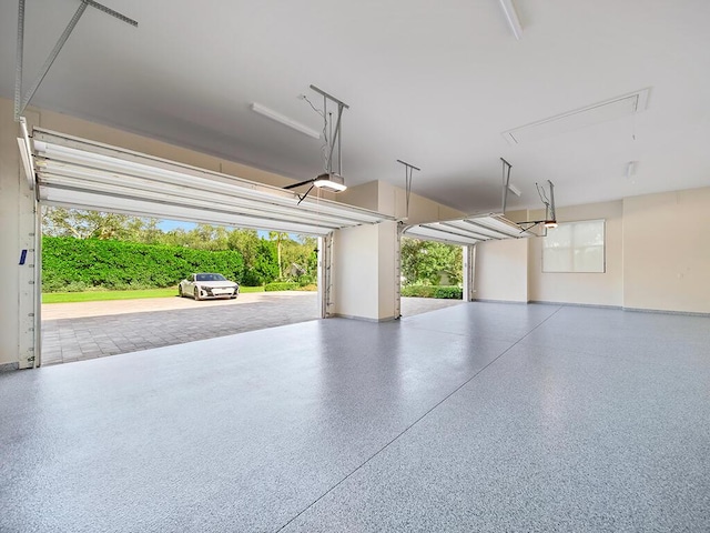 garage featuring a garage door opener