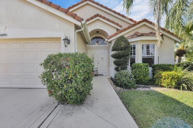 entrance to property with a garage