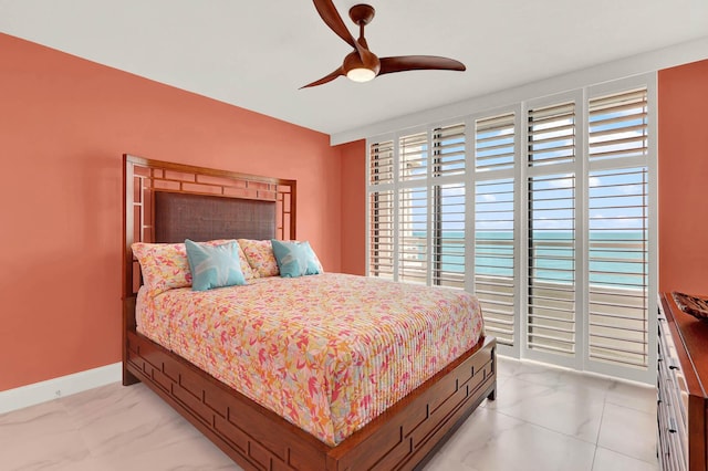 bedroom featuring access to outside and ceiling fan