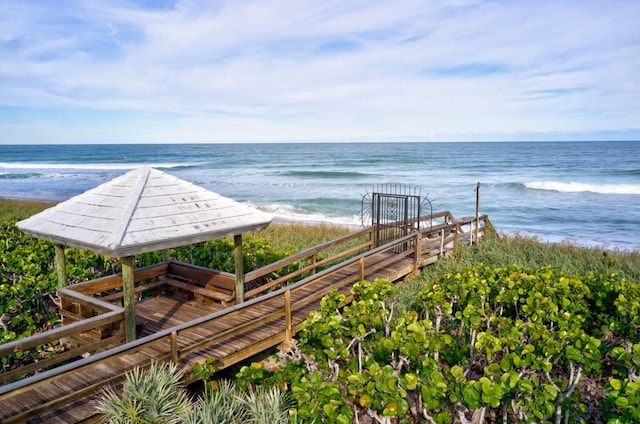 property view of water featuring a gazebo and a view of the beach