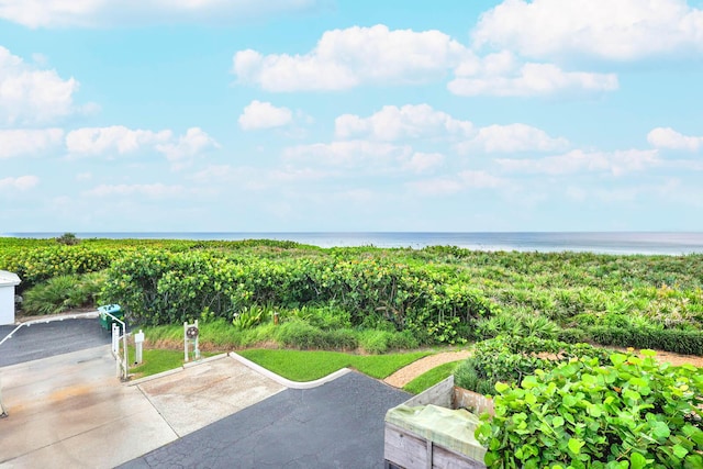 view of patio featuring a water view