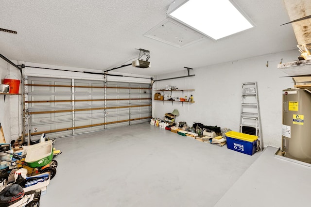 garage featuring water heater and a garage door opener