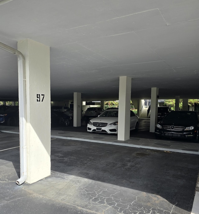 garage featuring a carport