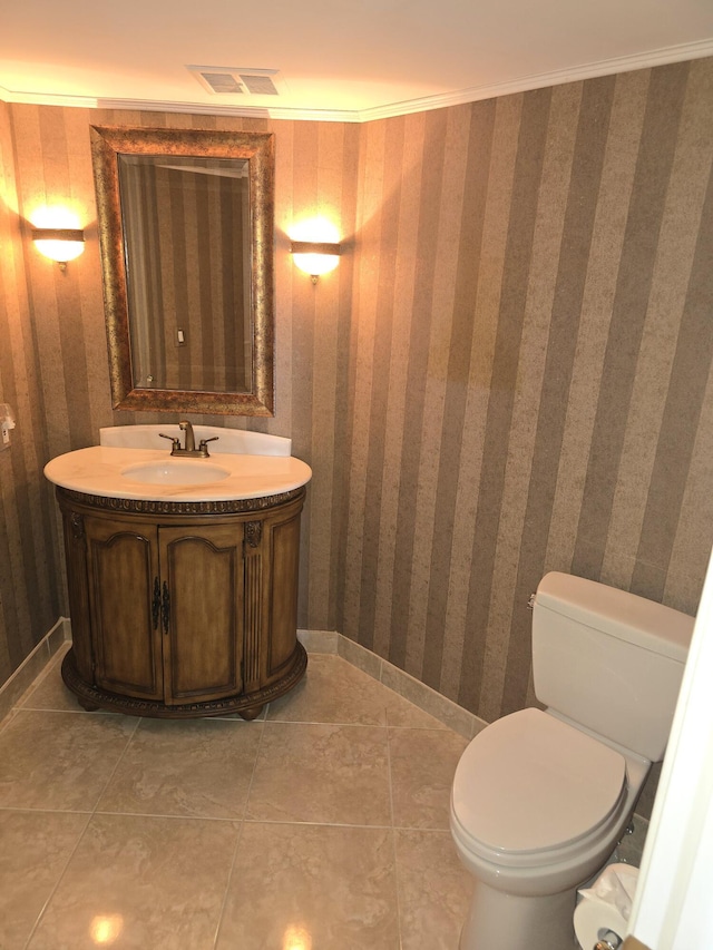 bathroom with tile patterned floors, vanity, and toilet