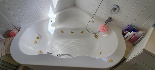 bathroom featuring a tub to relax in