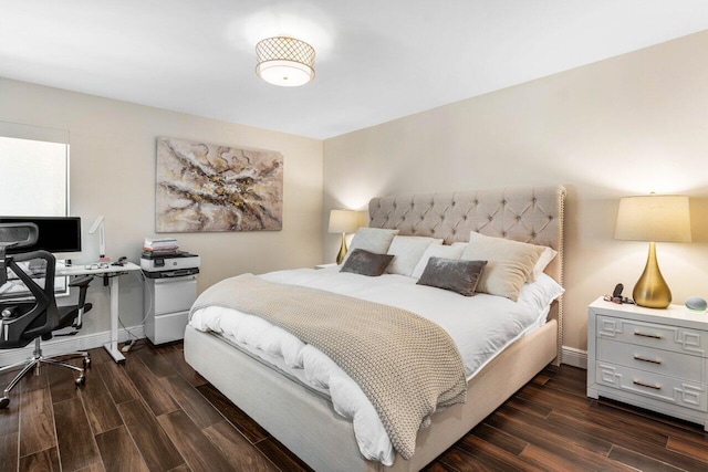 bedroom featuring dark hardwood / wood-style flooring