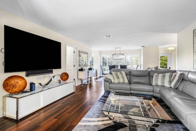 living room with dark hardwood / wood-style floors