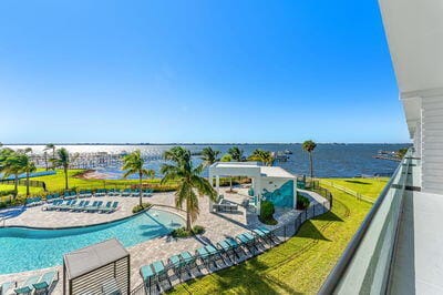 view of swimming pool with a water view