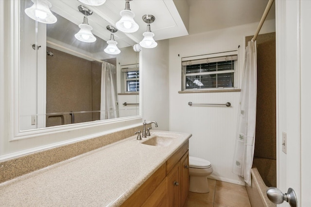 full bathroom with vanity, toilet, tile patterned flooring, and shower / bath combo with shower curtain