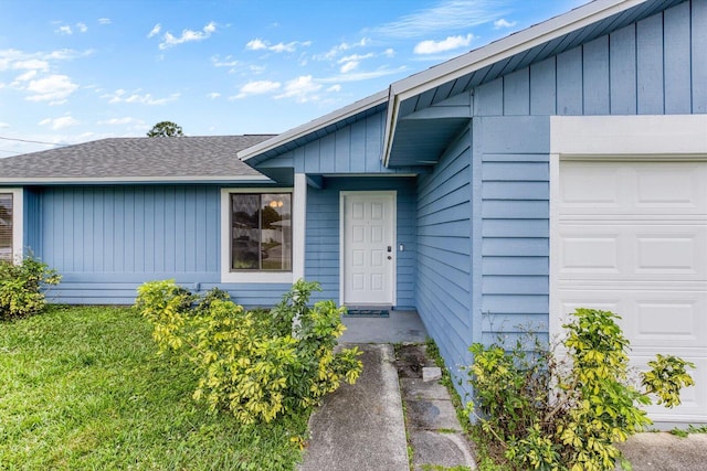 property entrance with a garage