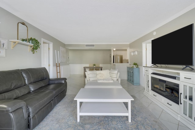 living room with light tile patterned floors