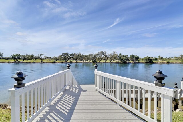 view of patio with a water view