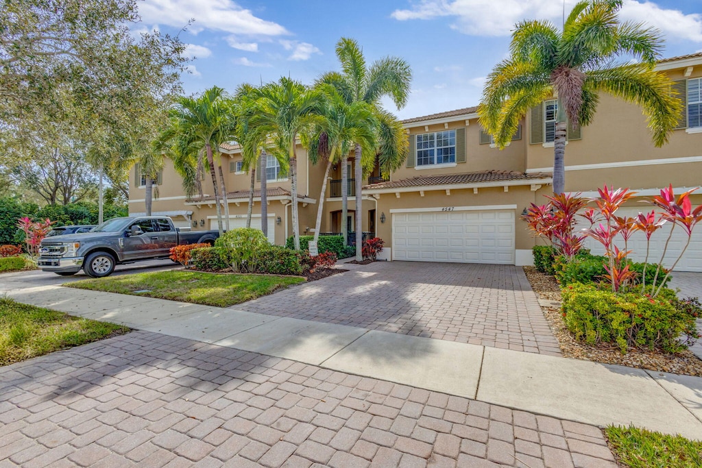 view of front of property with a garage