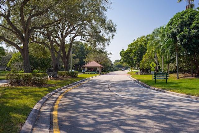 surrounding community featuring a yard
