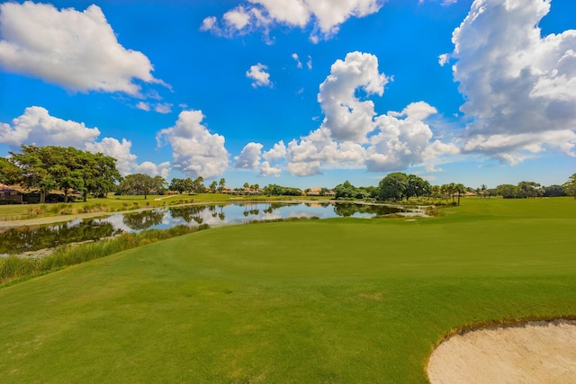 view of community featuring a water view and golf course view