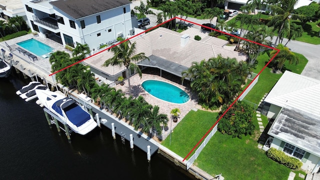 drone / aerial view with a water view