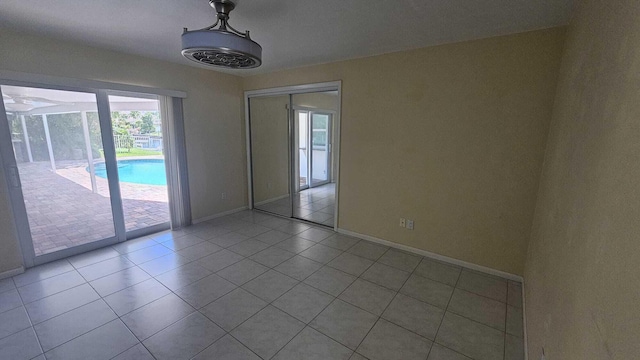 view of tiled spare room