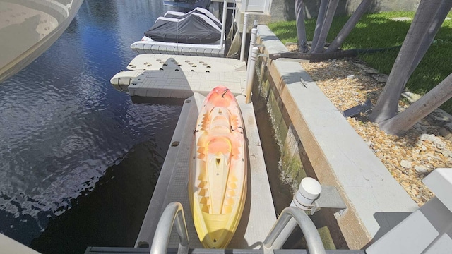 view of dock with a water view