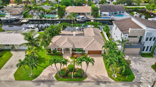 drone / aerial view with a water view