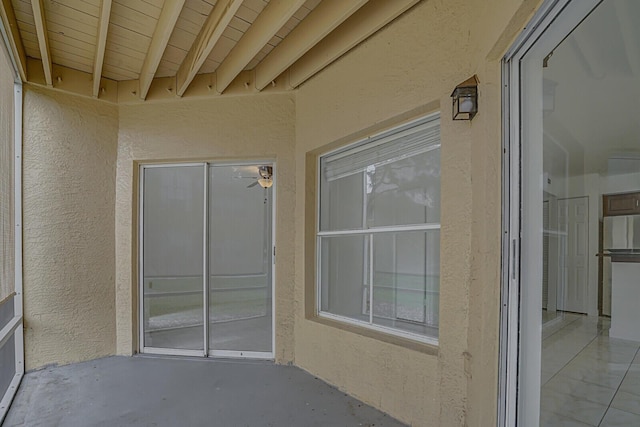 entrance to property featuring a patio area