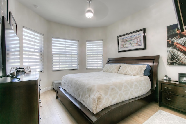 bedroom with light wood-type flooring