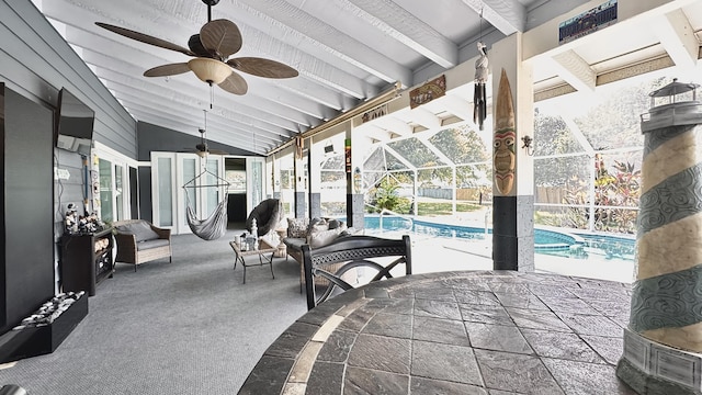 view of patio / terrace featuring an outdoor pool, a lanai, and ceiling fan