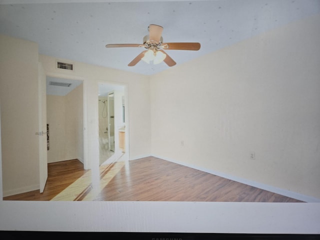 unfurnished room featuring light hardwood / wood-style flooring