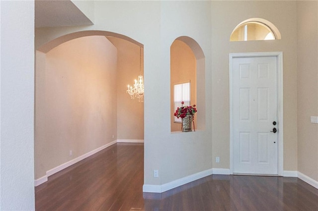 foyer with dark wood-type flooring