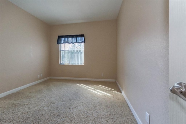 empty room featuring carpet