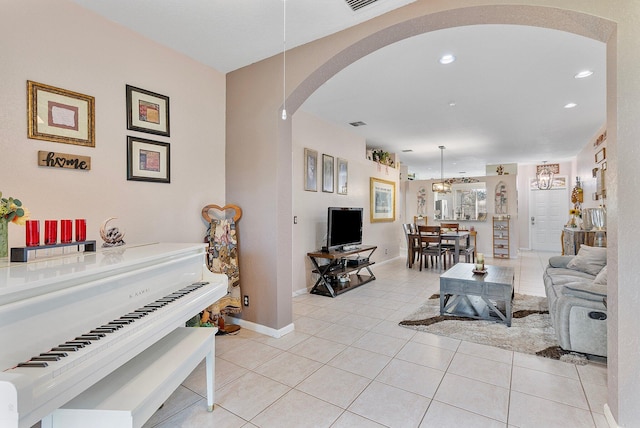 living room with light tile patterned floors