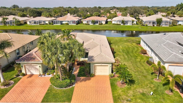 drone / aerial view featuring a water view