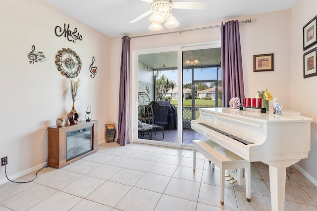 miscellaneous room featuring light tile patterned floors and ceiling fan